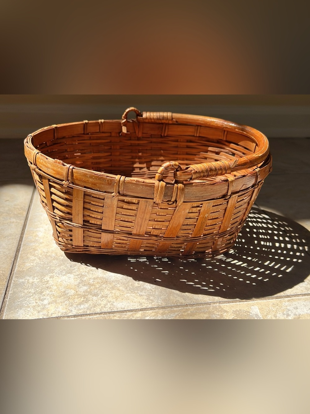 Vintage woven basket with wood handle